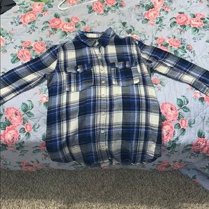 A plaid black and blue shirt